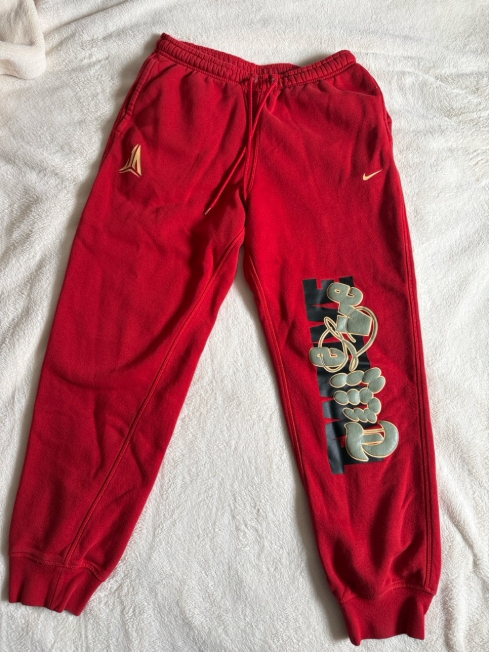 Nike Kids Red Graphic Fleece Joggers with Gold Accents